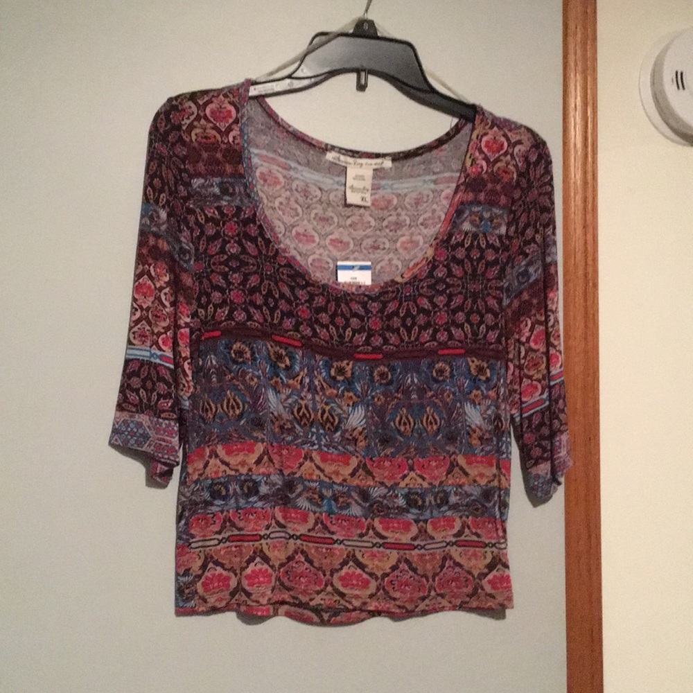 Never worn, still has the tag, American rag XL top